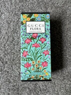 Gucci, Kilian, and Kate Spade boxes